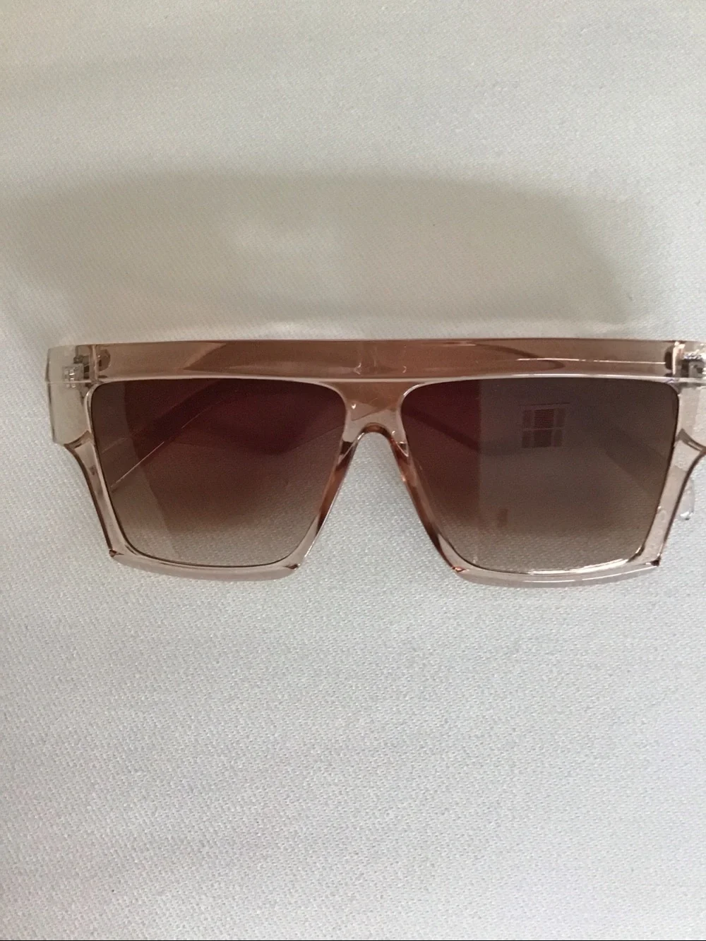 Sunglasses, peaches color.
